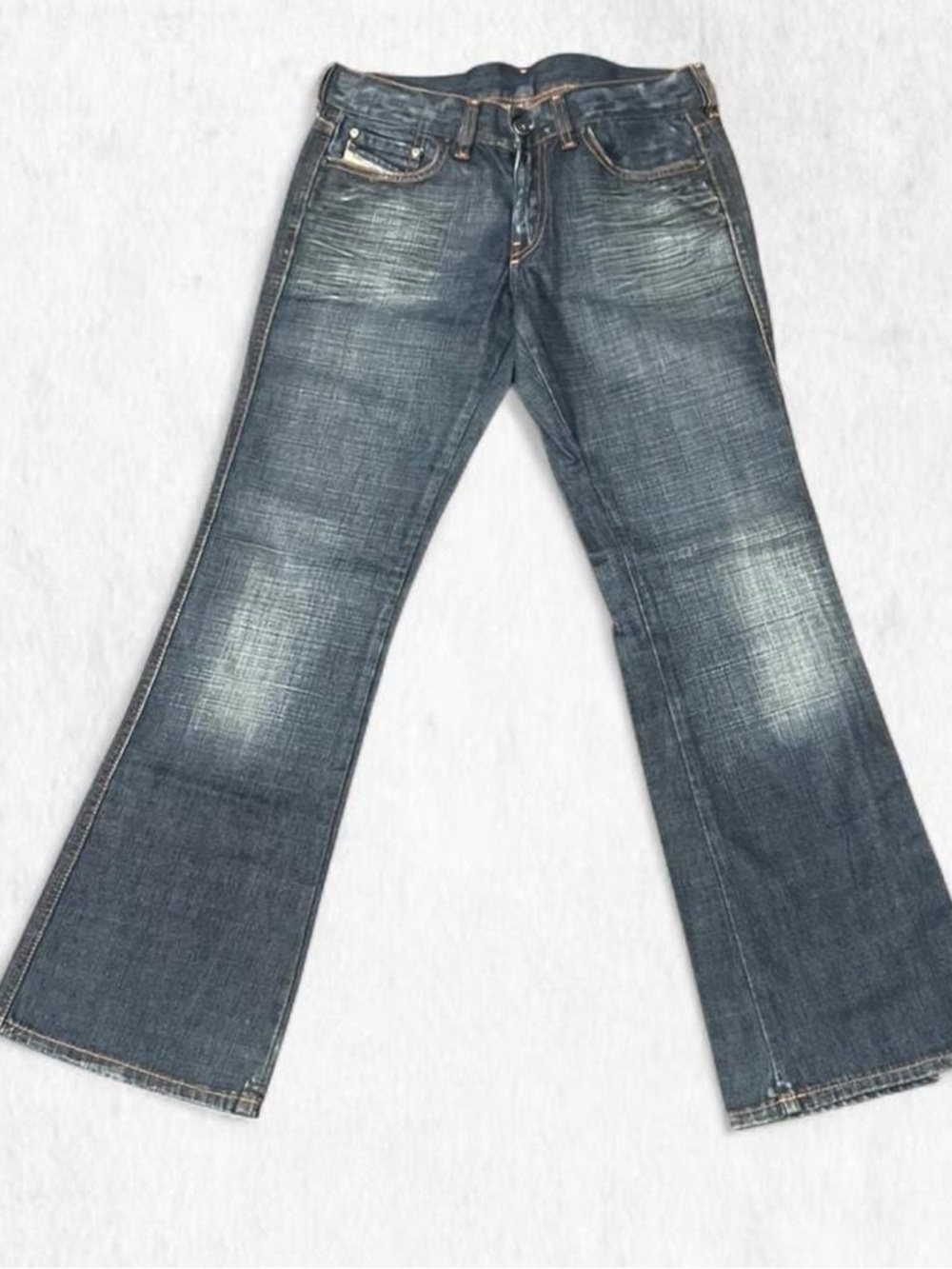 Diesel RAME Low rise flare jeans with raw dark indigo denim